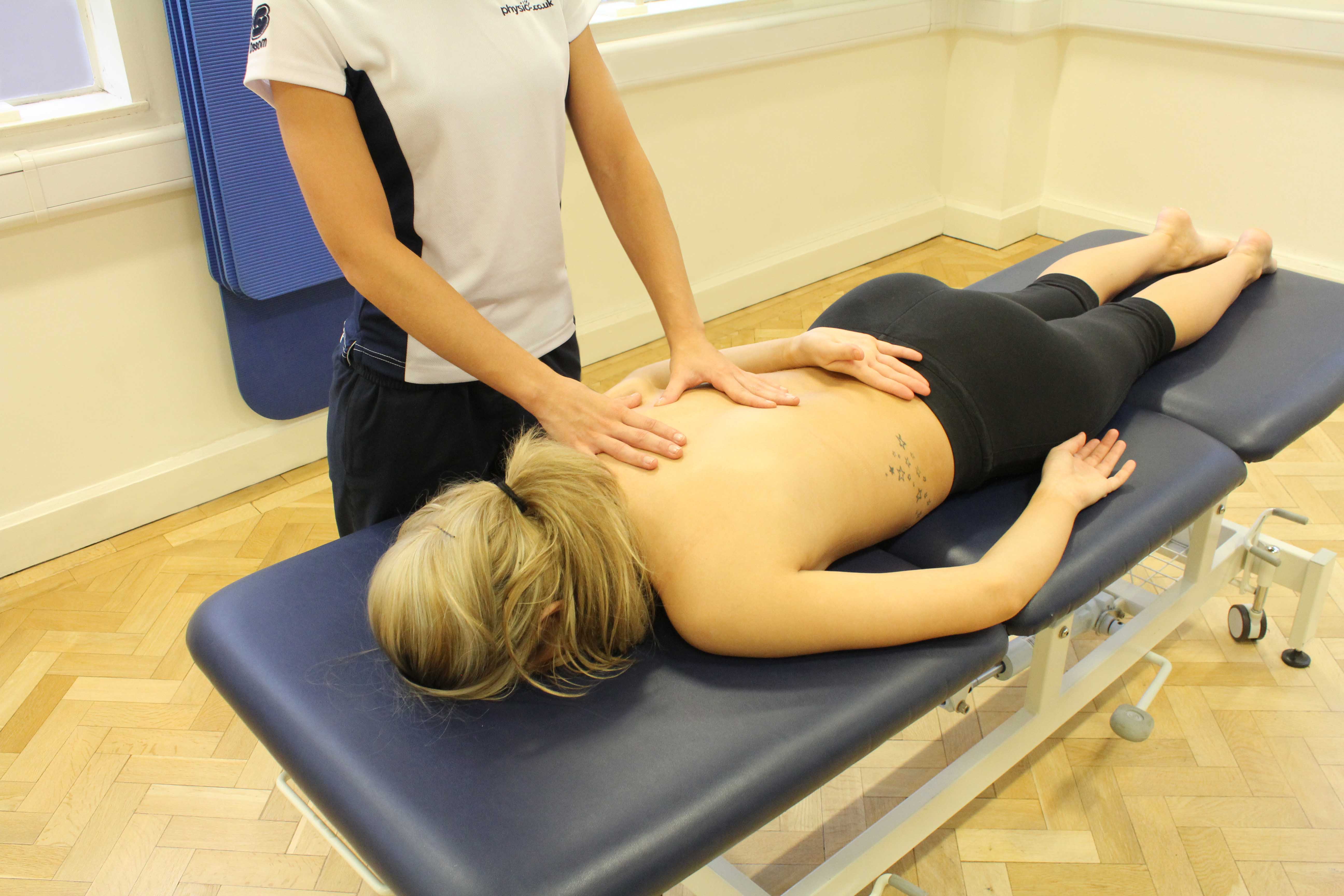 Passive stretch of the shoulder joint by a specialist Passive stretch of the shoulder joint by a specialist