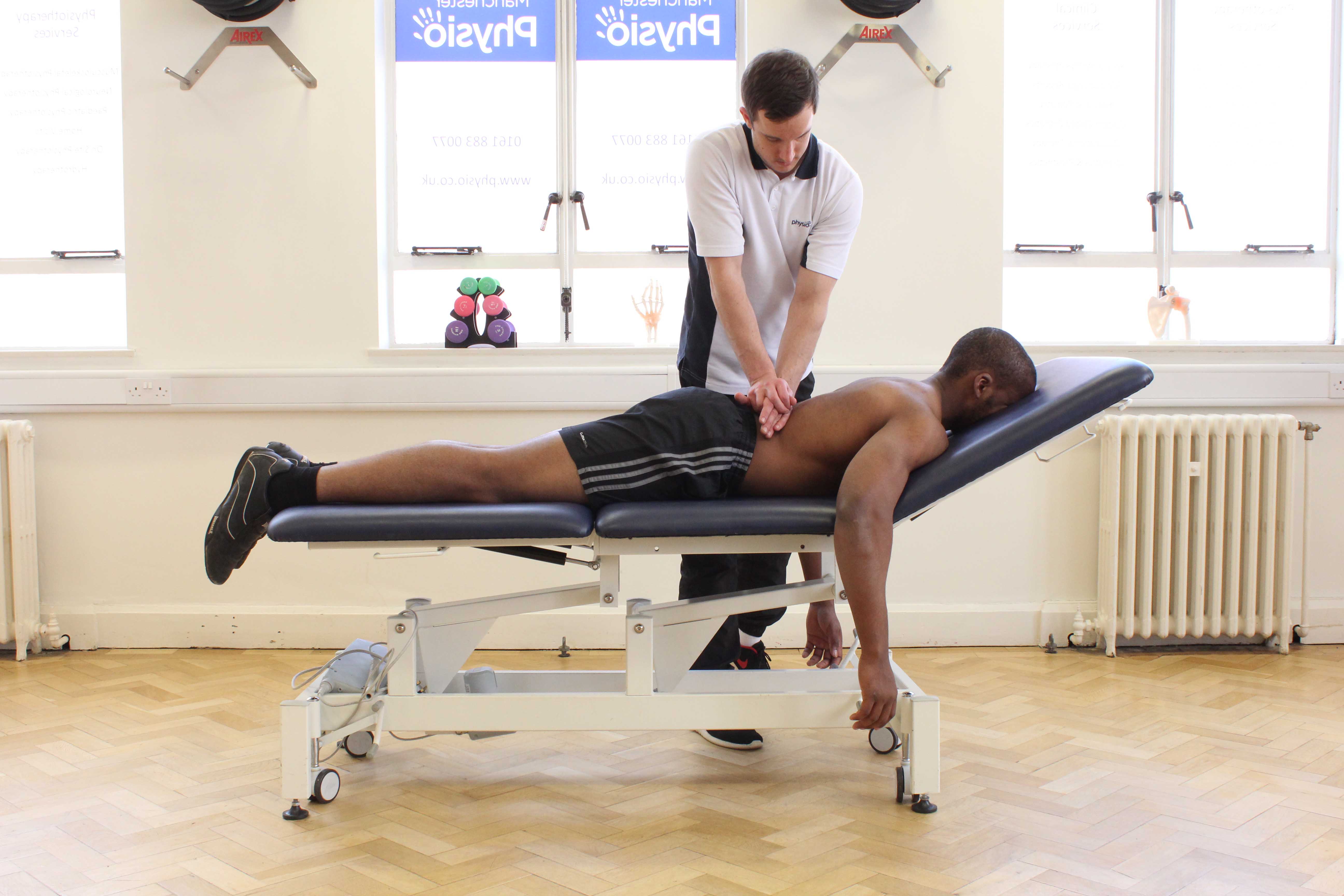 Mobilisations of the vertebrea in the lower back by experienced therapist Mobilisations of the vertebrea in the lower back by experienced therapist