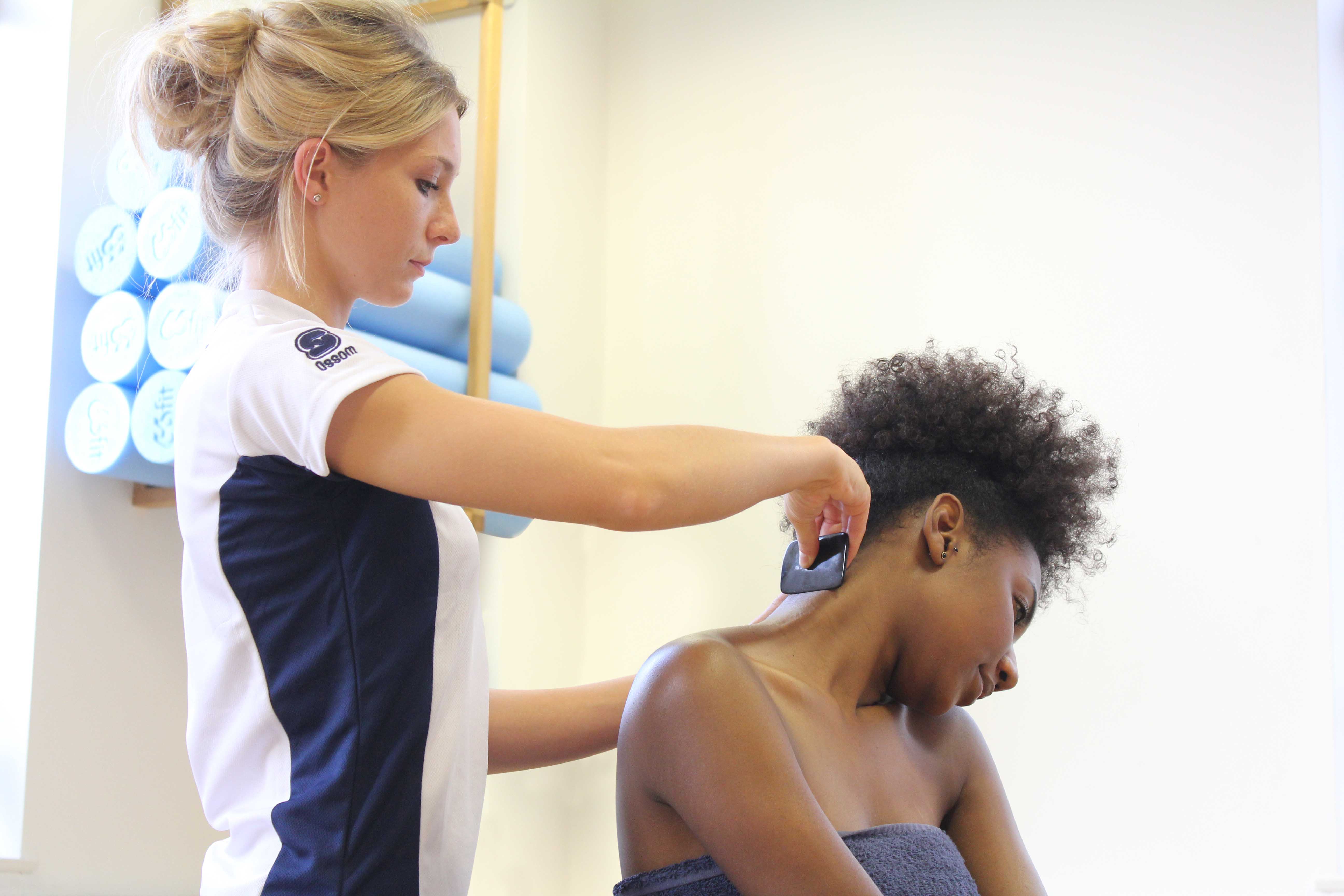 Soft tissue mobilisation using a therapy aid with a technique called stripping