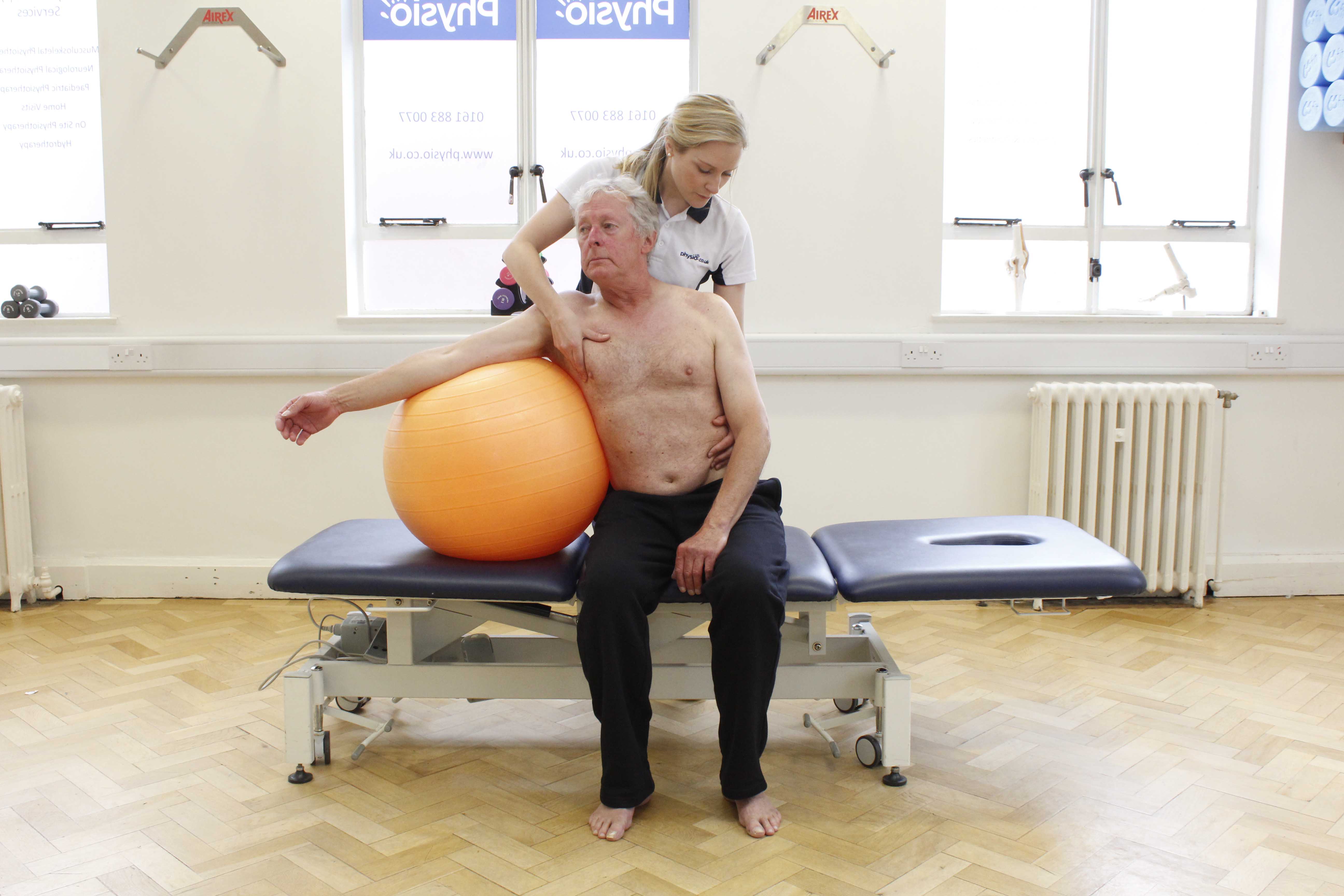 Mobilisation and stretch exercises for the spine assisted by an experienced physiotherapist Mobilisation and stretch exercises for the spine assisted by an experienced physiotherapist