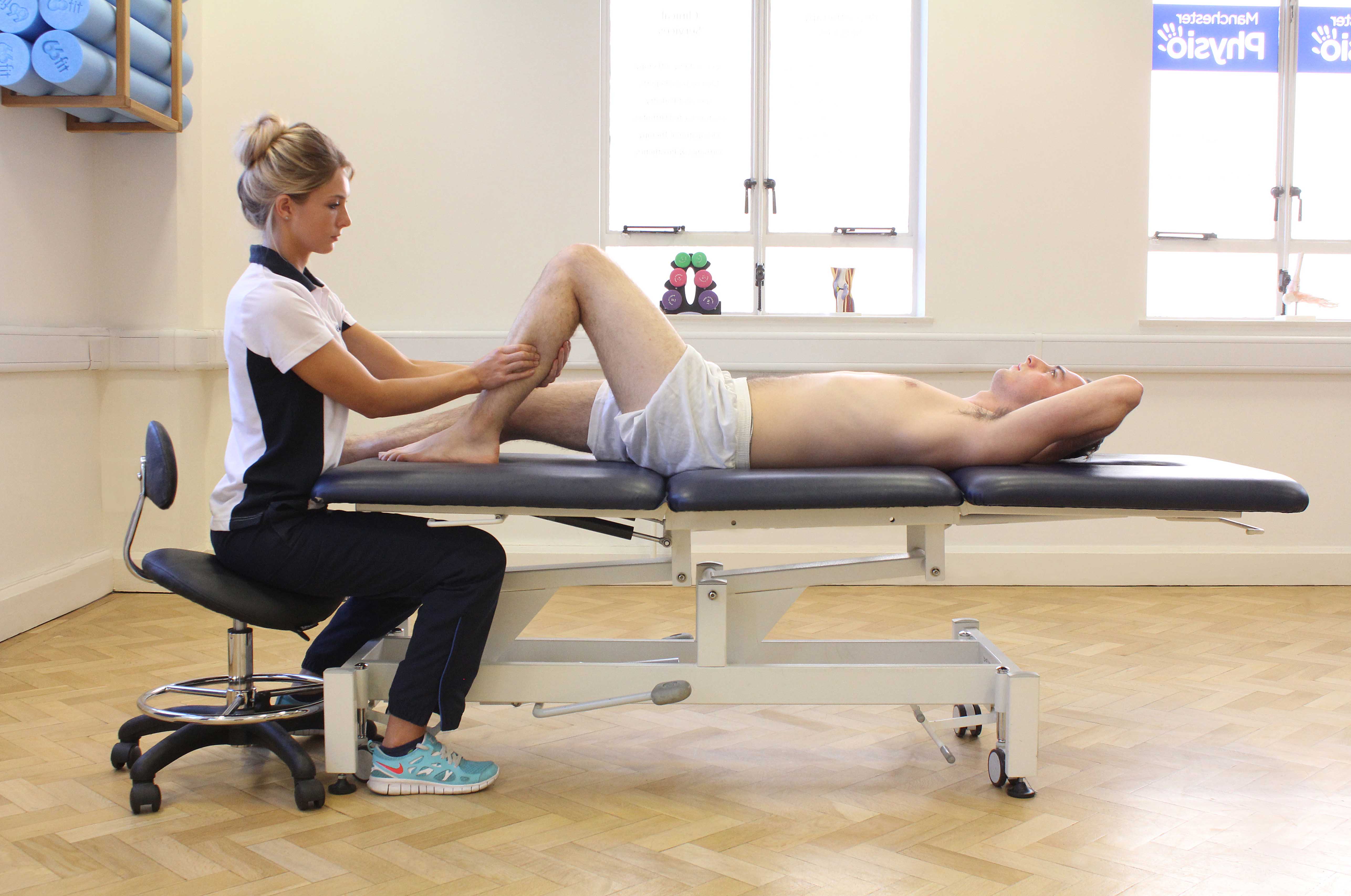 Deep tissue massage apllied to the gastrocnemius muscle by specialist therapist Deep tissue massage apllied to the gastrocnemius muscle by specialist therapist