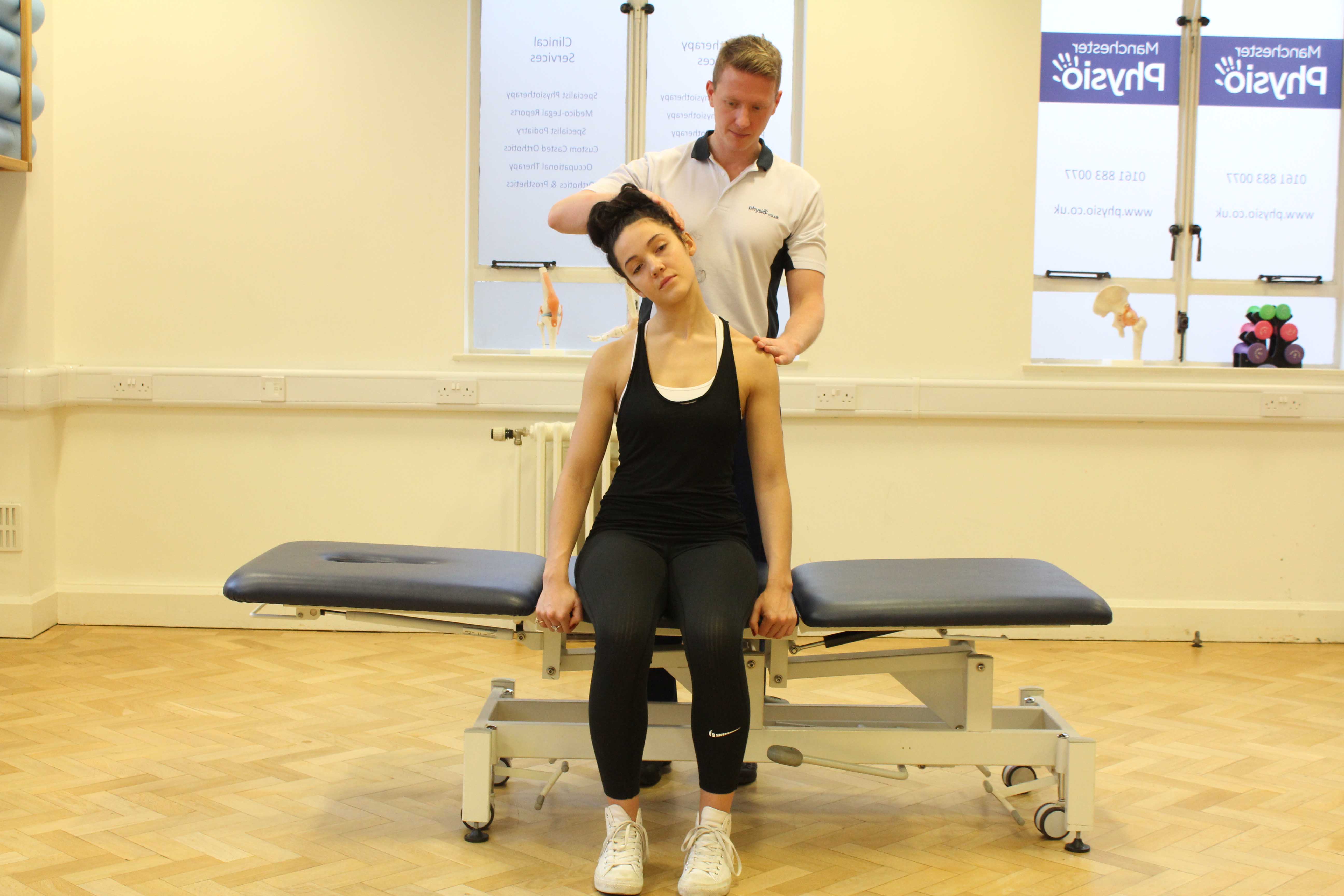 Assessment of the cervical spine, muscles and connective tissues in the neck performed by an experienced Physiotherapist Assessment of the cervical spine, muscles and connective tissues in the neck performed by an experienced Physiotherapist