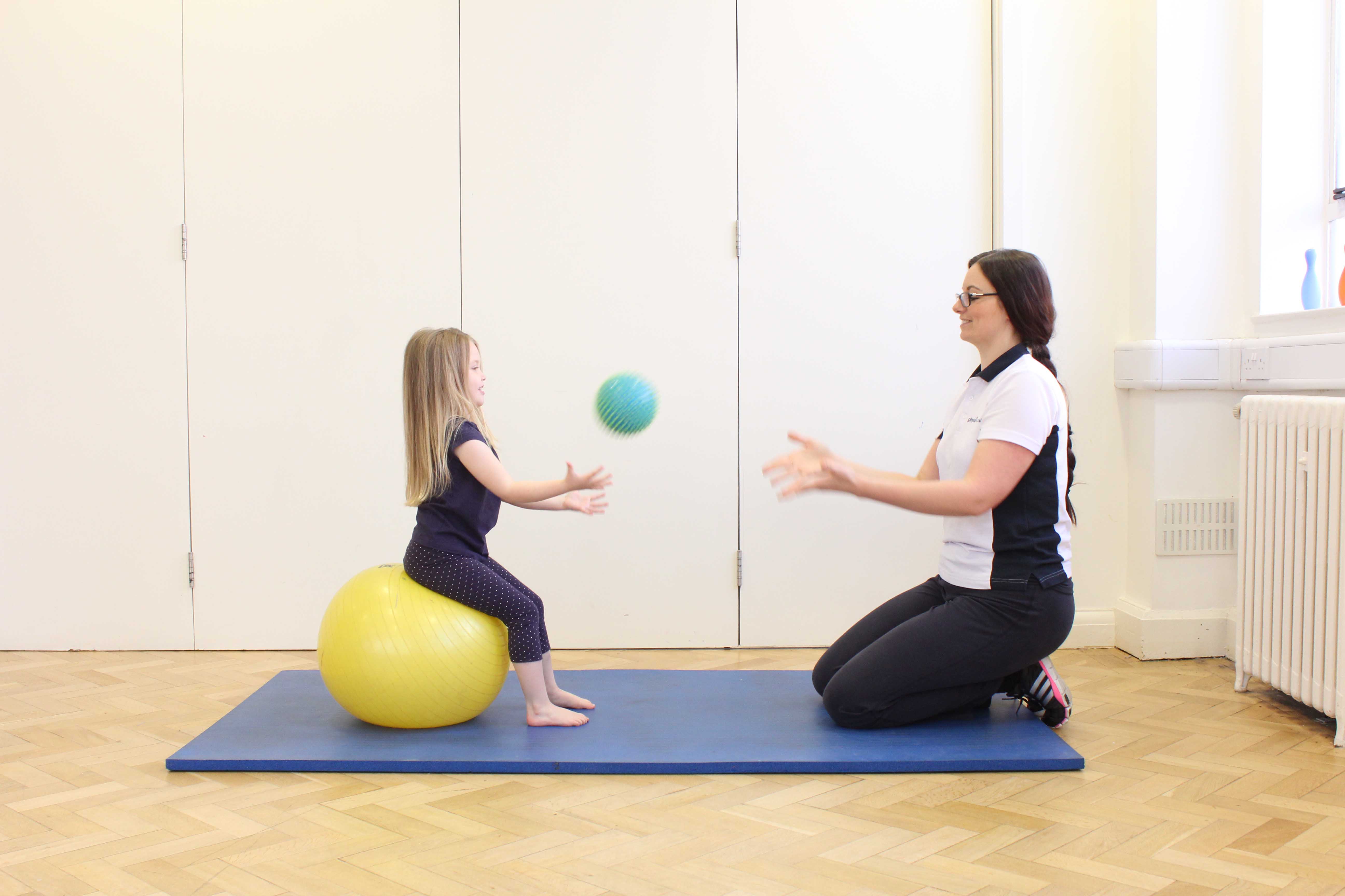 Passive abdominal stretch applied by paediatric physiotherapist Passive abdominal stretch applied by paediatric physiotherapist