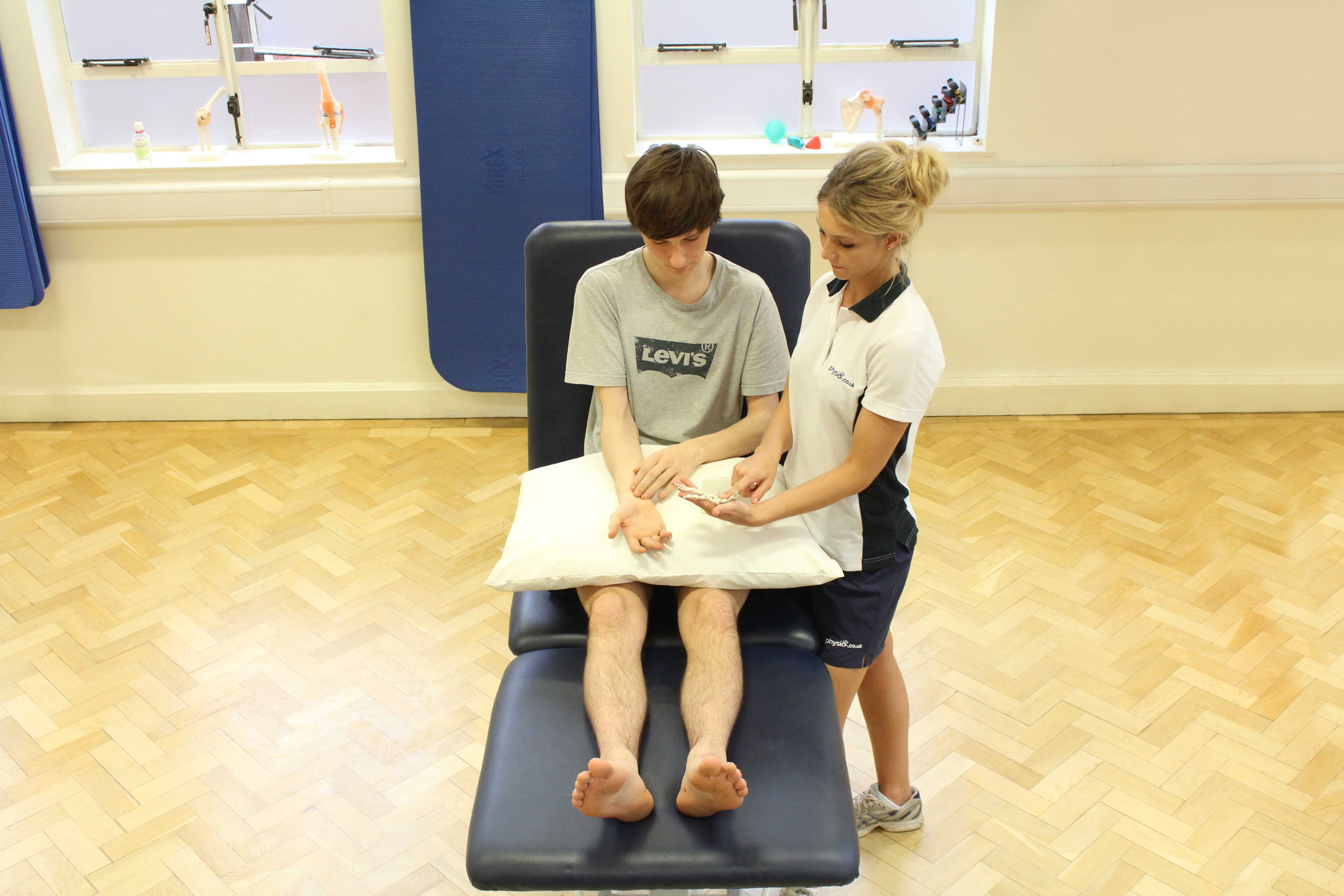 Mobilisations and massage of wrist by specialist physiotherapist
